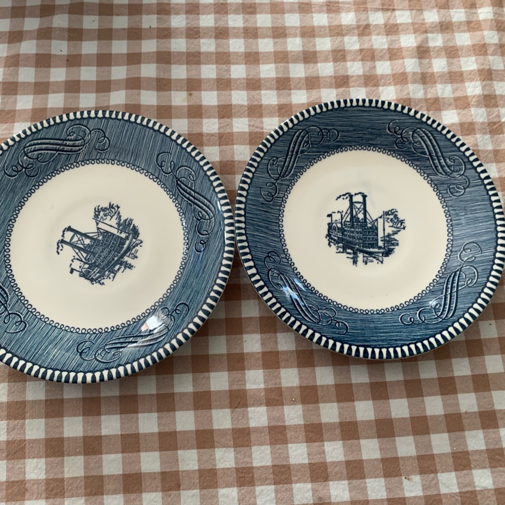 Vintage Royal China Currier & Ives "Steamboat" blue and white ceramic saucers.